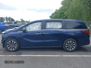 2022 Honda Odyssey EX-L with VIN 5FNRL6H70NB053843, listed as a IAAI auction lot 40210685 with 21,571 mi miles and . Bid and sale history available at DreamBid. Image 15.