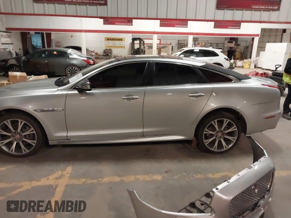 2015 Jaguar XJ with VIN SAJWA1CZ8F8V83873, listed as a IAAI auction lot 41271111 with 94,830 mi miles. Bid and sale history available at carsss.com. Image 15.
