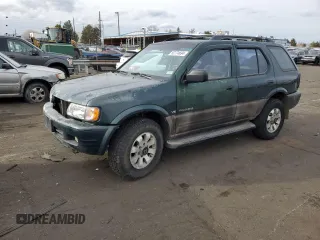 2000 Honda Passport LX z VIN 4S6DM58W0Y4406220, wystawiony jako Copart lot #82774694 z przebiegiem 171 487 mil mil oraz Szkoda całkowita • Salvage title. Historia ofert i sprzedaży dostępna na DreamBid. Obrazek 1.