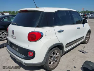 2014 FIAT 500L Trekking with VIN ZFBCFADH2EZ007586, listed as a IAAI auction lot 42040589 with 69,793 mi miles. Bid and sale history available at carsss.com. Image 4.