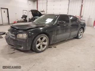 2009 Dodge Charger R/T with VIN 2B3KA53T59H581515, listed as a IAAI auction lot 41374914 with 289,305 mi miles. Bid and sale history available at carsss.com. Image 2.