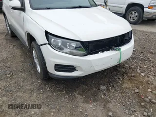 2012 Volkswagen Tiguan SE z VIN WVGAV7AX4CW546713, wystawiony jako IAAI lot #41929324 z przebiegiem 167 746 mil mil oraz . Historia ofert i sprzedaży dostępna na DreamBid. Obrazek 6.