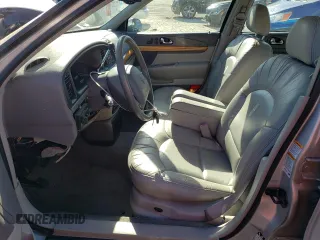 2001 Lincoln Continental with VIN 1LNHM97V31Y641106, listed as a Copart auction lot 77468194 with 86,363 mi miles and Clean Title. Bid and sale history available at carsss.com. Image 7.