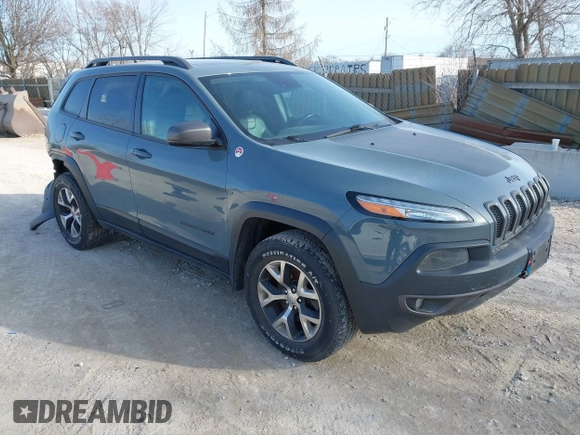 2014 Jeep Cherokee Trailhawk z VIN 1C4PJMBS5EW147579, wystawiony jako IAAI lot #41781543 z przebiegiem 155 751 mil mil oraz . Historia ofert i sprzedaży dostępna na DreamBid. Obrazek 1.