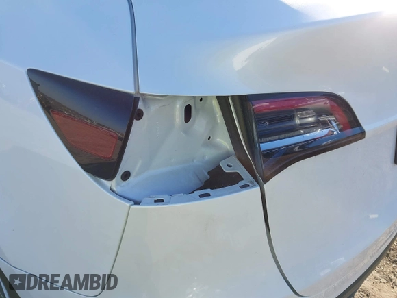 2023 Tesla Model Y Long Range z VIN 7SAYGDEE5PF765326, wystawiony jako IAAI lot #41757113 z przebiegiem 10 461 mil mil oraz . Historia ofert i sprzedaży dostępna na DreamBid. Obrazek 23.