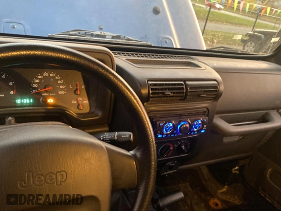 2003 Jeep Wrangler SE with VIN 1J4FA29143P371506, listed as a Copart auction lot 80153184 with 101,513 mi miles and Clean title. Bid and sale history available at DreamBid. Image 9.