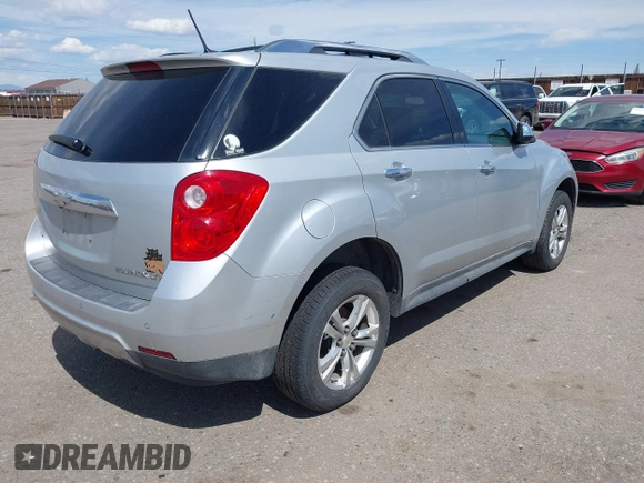 2013 Chevrolet Equinox LTZ z VIN 2GNFLGEKXD6309001, wystawiony jako IAAI lot #42058332 z przebiegiem 144 250 mil mil oraz . Historia ofert i sprzedaży dostępna na DreamBid. Obrazek 4.