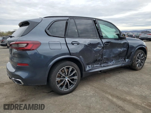2021 BMW X5 xDrive45e with VIN 5UXTA6C08M9H34879, listed as a Copart auction lot 51859425 with 0 mi miles and Salvage Title. Bid and sale history available at carsss.com. Image 3.