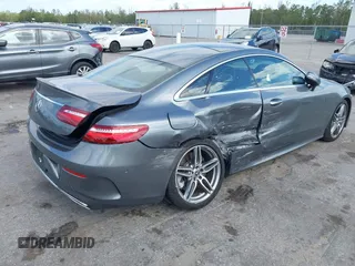 2018 Mercedes-Benz E 400 with VIN WDD1J6FB9JF015064, listed as a IAAI auction lot 42165914 with 95,290 mi miles and . Bid and sale history available at DreamBid. Image 4.