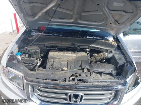 2014 Honda Ridgeline RTL with VIN 5FPYK1F51EB012843, listed as a IAAI auction lot 41629002 with 114,761 mi miles. Bid and sale history available at carsss.com. Image 10.