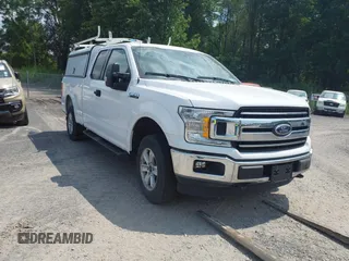 2019 Ford F-150 XL with VIN 1FTFX1E44KKE41449, listed as a IAAI auction lot 42646629 with 57,060 mi miles and . Bid and sale history available at DreamBid. Image 1.