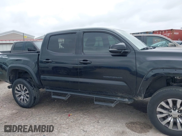 2017 Toyota Tacoma SR5 with VIN 5TFAZ5CN8HX052459, listed as a IAAI auction lot 41495281 with 212,314 mi miles and . Bid and sale history available at DreamBid. Image 13.