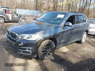 2014 BMW X5 xDrive35i with VIN 5UXKR0C55E0K47655, listed as a IAAI auction lot 41643776 with 154,380 mi miles. Bid and sale history available at carsss.com. Image 18.