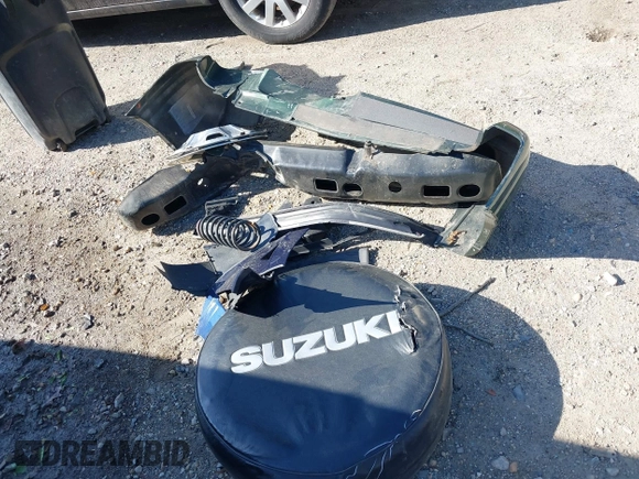 2001 Suzuki Vitara JX z VIN 2S3TD52V416109787, wystawiony jako IAAI lot #42126699 z przebiegiem Nie podano mil oraz . Historia ofert i sprzedaży dostępna na DreamBid. Obrazek 11.
