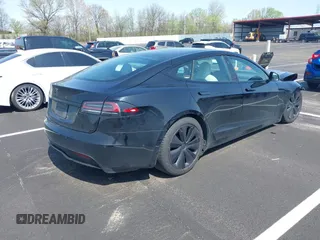 2022 Tesla Model S z VIN 5YJSA1E56NF490064, wystawiony jako IAAI lot #41858477 z przebiegiem Nie podano mil oraz . Historia ofert i sprzedaży dostępna na DreamBid. Obrazek 4.