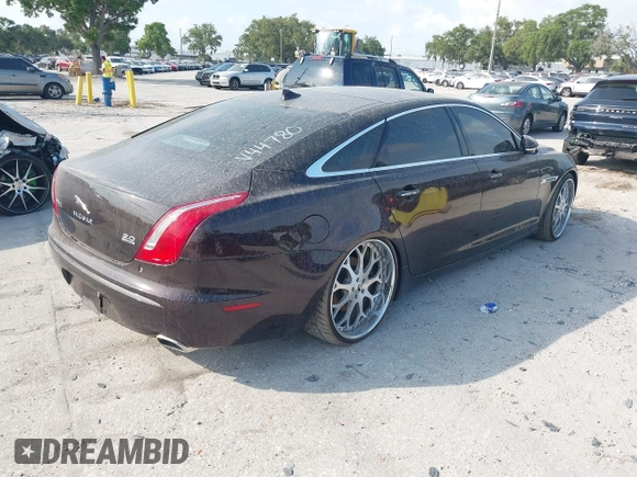 2013 Jaguar XJ Portfolio with VIN SAJWJ2GD2D8V44780, listed as a IAAI auction lot 41875069 with 87,806 mi miles and . Bid and sale history available at DreamBid. Image 4.