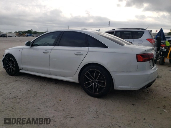 2016 Audi A6 3.0T Prestige with VIN WAUHGAFC3GN114316, listed as a Copart auction lot 54568015 with 105,855 mi miles and Salvage Title. Bid and sale history available at carsss.com. Image 2.