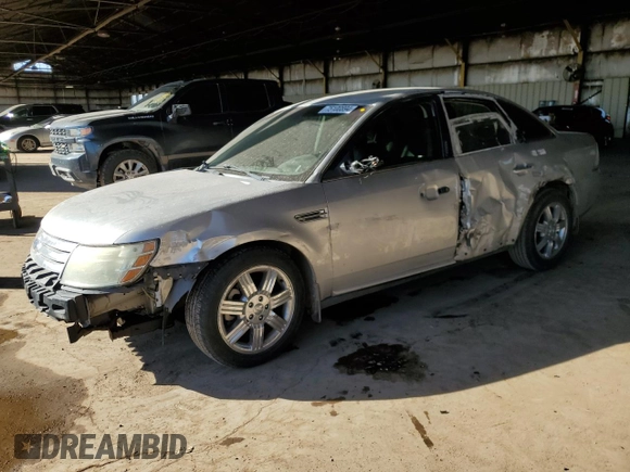 2009 Ford Taurus Limited with VIN 1FAHP25W99G123958, listed as a Copart auction lot 75100894 with 187,735 mi miles and Salvage Title. Bid and sale history available at carsss.com. Image 1.