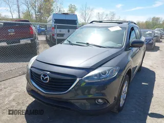 2015 Mazda CX-9 Touring z VIN JM3TB3CV3F0465162, wystawiony jako IAAI lot #42112814 z przebiegiem 108 623 mil mil oraz . Historia ofert i sprzedaży dostępna na DreamBid. Obrazek 2.