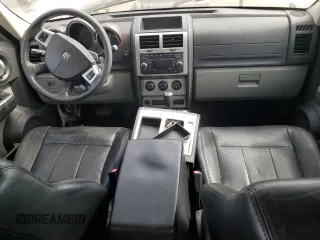 2010 Dodge Nitro SXT z VIN 1D4PT5GK8AW100343, wystawiony jako Copart lot #74628804 z przebiegiem 156 612 mil mil oraz Szkoda całkowita • Salvage title. Historia ofert i sprzedaży dostępna na DreamBid. Obrazek 8.