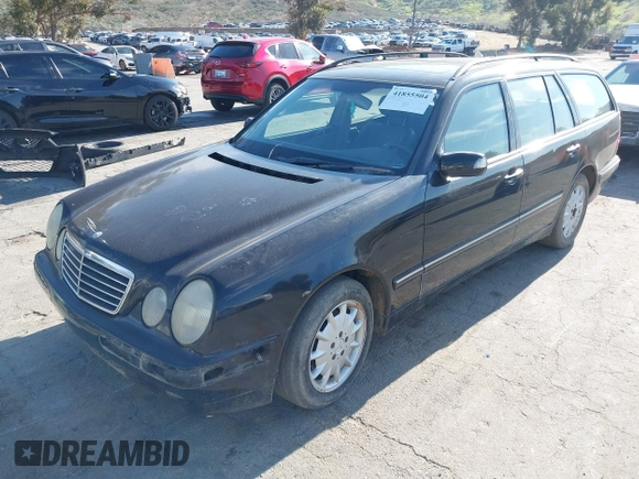 2001 Mercedes-Benz E-Class with VIN WDBJH65J31B381879, listed as a IAAI auction lot 41855504 with 153,667 mi miles. Bid and sale history available at carsss.com. Image 2.