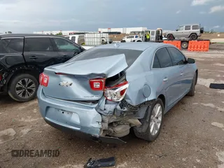 2013 Chevrolet Malibu LTZ with VIN 1G11H5SA0DU109940, listed as a IAAI auction lot 42106086 with 205,634 mi miles and . Bid and sale history available at DreamBid. Image 4.