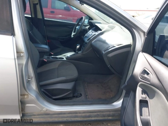 2012 Ford Focus SE with VIN 1FAHP3F22CL115877, listed as a IAAI auction lot 42031223 with 138,743 mi miles. Bid and sale history available at carsss.com. Image 5.