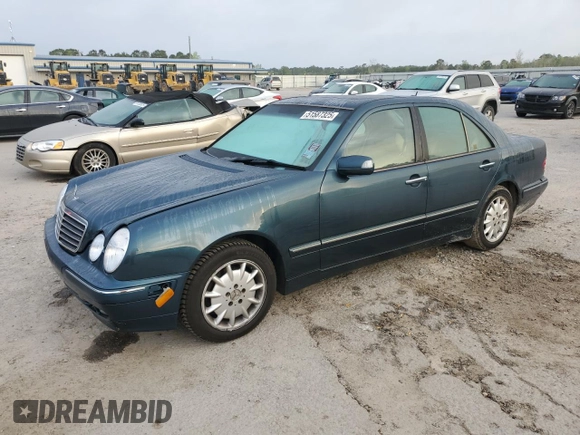 2000 Mercedes-Benz E-Class with VIN WDBJF65J1YB103093, listed as a Copart auction lot 51587325 with 208,350 mi miles and Salvage Title. Bid and sale history available at carsss.com. Image 1.