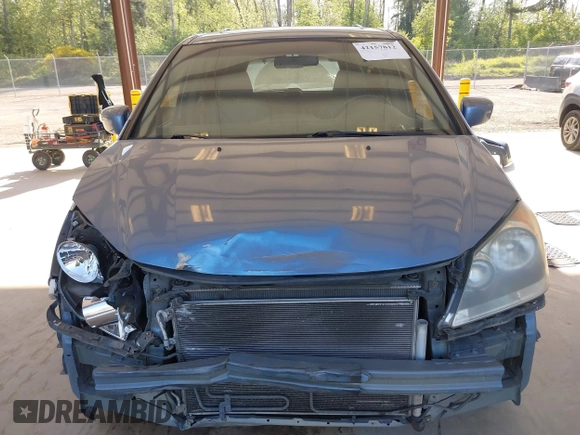 2010 Honda Odyssey EX-L with VIN 5FNRL3H61AB046416, listed as a IAAI auction lot 42157812 with 129,525 mi miles and . Bid and sale history available at DreamBid. Image 6.