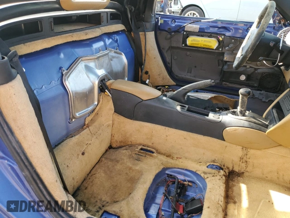1998 Porsche Boxster с VIN WP0CA2989WU626453, выставлен на аукционе Copart как лот 54971925 с пробегом 116 461 миль миль и На запчасти • Non repairable. История ставок и продаж доступна на DreamBid. Изображение 10.