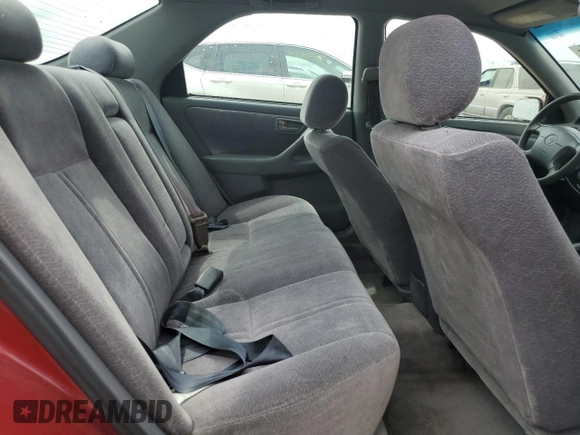 1998 Toyota Camry LE z VIN JT2BG22K6W0179063, wystawiony jako Copart lot #56998295 z przebiegiem 251 129 mil mil oraz Szkoda całkowita • Salvage title. Historia ofert i sprzedaży dostępna na DreamBid. Obrazek 10.