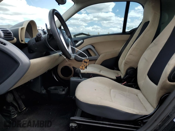 2009 Smart fortwo Pure with VIN WMEEJ31X89K251402, listed as a Copart auction lot 56791545 with 52,636 mi miles and Clean title. Bid and sale history available at DreamBid. Image 7.