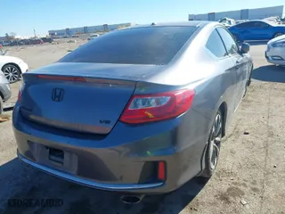 2014 Honda Accord Coupe EX-L with VIN 1HGCT2B84EA007555, listed as a IAAI auction lot 41064583 with 141,536 mi miles. Bid and sale history available at carsss.com. Image 4.