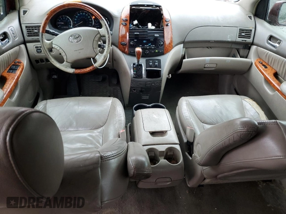 2006 Toyota Sienna XLE z VIN 5TDBA22C66S055082, wystawiony jako Copart lot #56832985 z przebiegiem 269 443 mil mil oraz Czysty tytuł • Clean title. Historia ofert i sprzedaży dostępna na DreamBid. Obrazek 8.