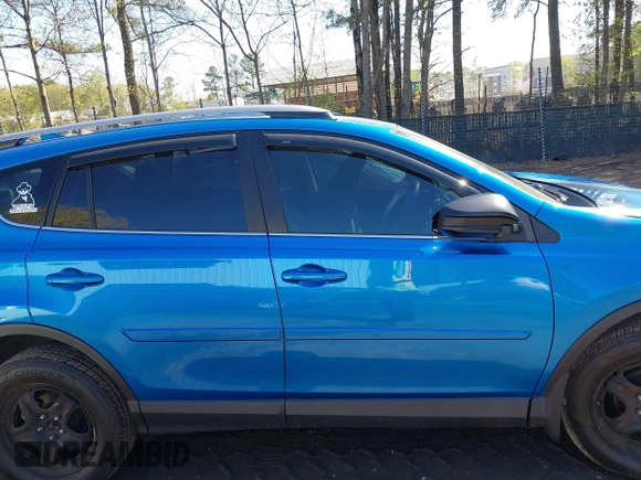 2018 Toyota RAV4 LE with VIN JTMBFREV3JJ253566, listed as a IAAI auction lot 41978107 with 49,729 mi miles. Bid and sale history available at carsss.com. Image 13.