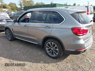 2014 BMW X5 xDrive35i with VIN 5UXKR0C52E0K50710, listed as a IAAI auction lot 40529606 with 114,307 mi miles. Bid and sale history available at carsss.com. Image 3.
