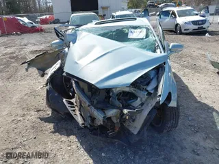 2014 Ford Fusion SE Hybrid with VIN 3FA6P0LU0ER304804, listed as a IAAI auction lot 41817607 with 202,590 mi miles. Bid and sale history available at carsss.com. Image 6.