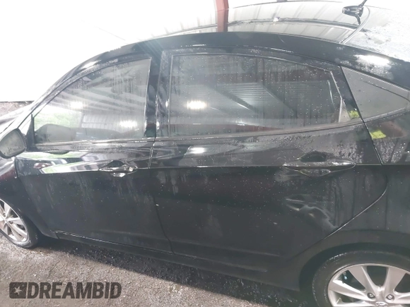 2012 Hyundai Accent GLS z VIN KMHCU4AEXCU059553, wystawiony jako IAAI lot #42207435 z przebiegiem 122 796 mil mil oraz . Historia ofert i sprzedaży dostępna na DreamBid. Obrazek 14.