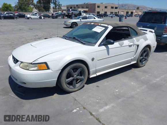 2004 Ford Mustang Deluxe z VIN 1FAFP44684F179912, wystawiony jako IAAI lot #42359560 z przebiegiem 268 207 mil mil oraz . Historia ofert i sprzedaży dostępna na DreamBid. Obrazek 2.