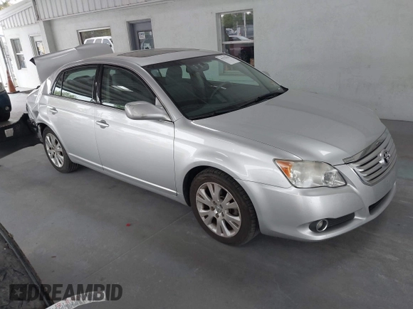 2009 Toyota Avalon XL with VIN 4T1BK36B69U341854, listed as a IAAI auction lot 41727553 with 102,369 mi miles. Bid and sale history available at carsss.com. Image 1.