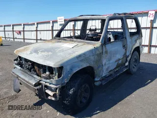1991 Mitsubishi Montero z VIN 2BG70124X43000753, wystawiony jako IAAI lot #42055421 z przebiegiem Nie podano mil oraz . Historia ofert i sprzedaży dostępna na DreamBid. Obrazek 2.
