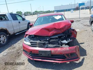 2017 Volkswagen Jetta S z VIN 3VW2B7AJ6HM232479, wystawiony jako IAAI lot #42579313 z przebiegiem 100 582 mil mil oraz . Historia ofert i sprzedaży dostępna na DreamBid. Obrazek 12.