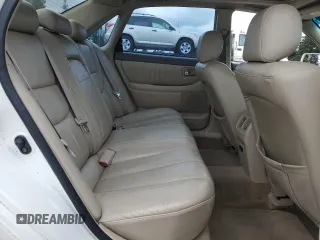 2001 Toyota Avalon XL z VIN 4T1BF28B31U136069, wystawiony jako Copart lot #57355025 z przebiegiem 217 489 mil mil oraz Szkody całkowita. Historia ofert i sprzedaży dostępna na DreamBid. Obrazek 10.