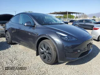 2024 Tesla Model Y z VIN 7SAYGDED2RF114150, wystawiony jako Copart lot #54754585 z przebiegiem 7 924 mil mil oraz Szkoda całkowita • Salvage title. Historia ofert i sprzedaży dostępna na DreamBid. Obrazek 4.