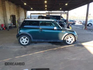 2002 MINI Hardtop with VIN WMWRC33472TC34913, listed as a IAAI auction lot 41599382 with 150,177 mi miles and . Bid and sale history available at DreamBid. Image 13.