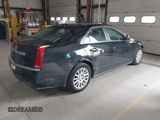 2011 Cadillac CTS Luxury with VIN 1G6DG5EYXB0145058, listed as a IAAI auction lot 41973156 with 143,246 mi miles and . Bid and sale history available at carsss.com. Image 4.