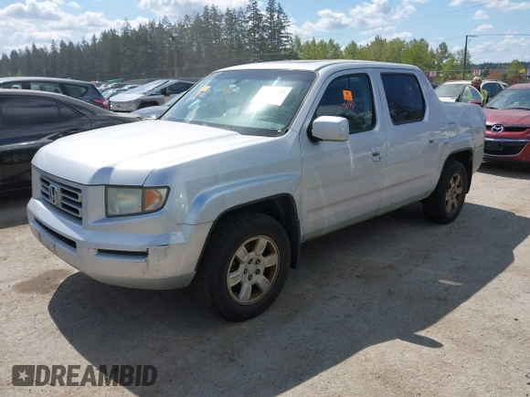 2006 Honda Ridgeline RTL with VIN 2HJYK16516H549986, listed as a IAAI auction lot 42084810 with 298,170 mi miles. Bid and sale history available at carsss.com. Image 2.