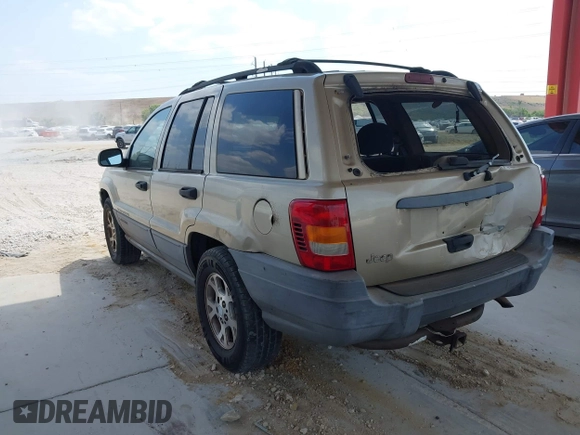 2001 Jeep Grand Cherokee Laredo with VIN 1J4GX48S81C589400, listed as a IAAI auction lot 42091559 with 219,698 mi miles and . Bid and sale history available at DreamBid. Image 3.