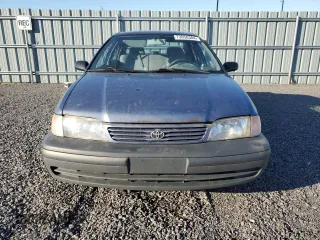 1999 Toyota Tercel z VIN JT2BC53L9X0354072, wystawiony jako Copart lot #73050384 z przebiegiem 163 566 mil mil oraz Szkody całkowita. Historia ofert i sprzedaży dostępna na DreamBid. Obrazek 5.