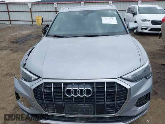 2021 Audi Q3 Premium with VIN WA1AUCF35M1131933, listed as a IAAI auction lot 41710739 with 93,293 mi miles and . Bid and sale history available at DreamBid. Image 12.
